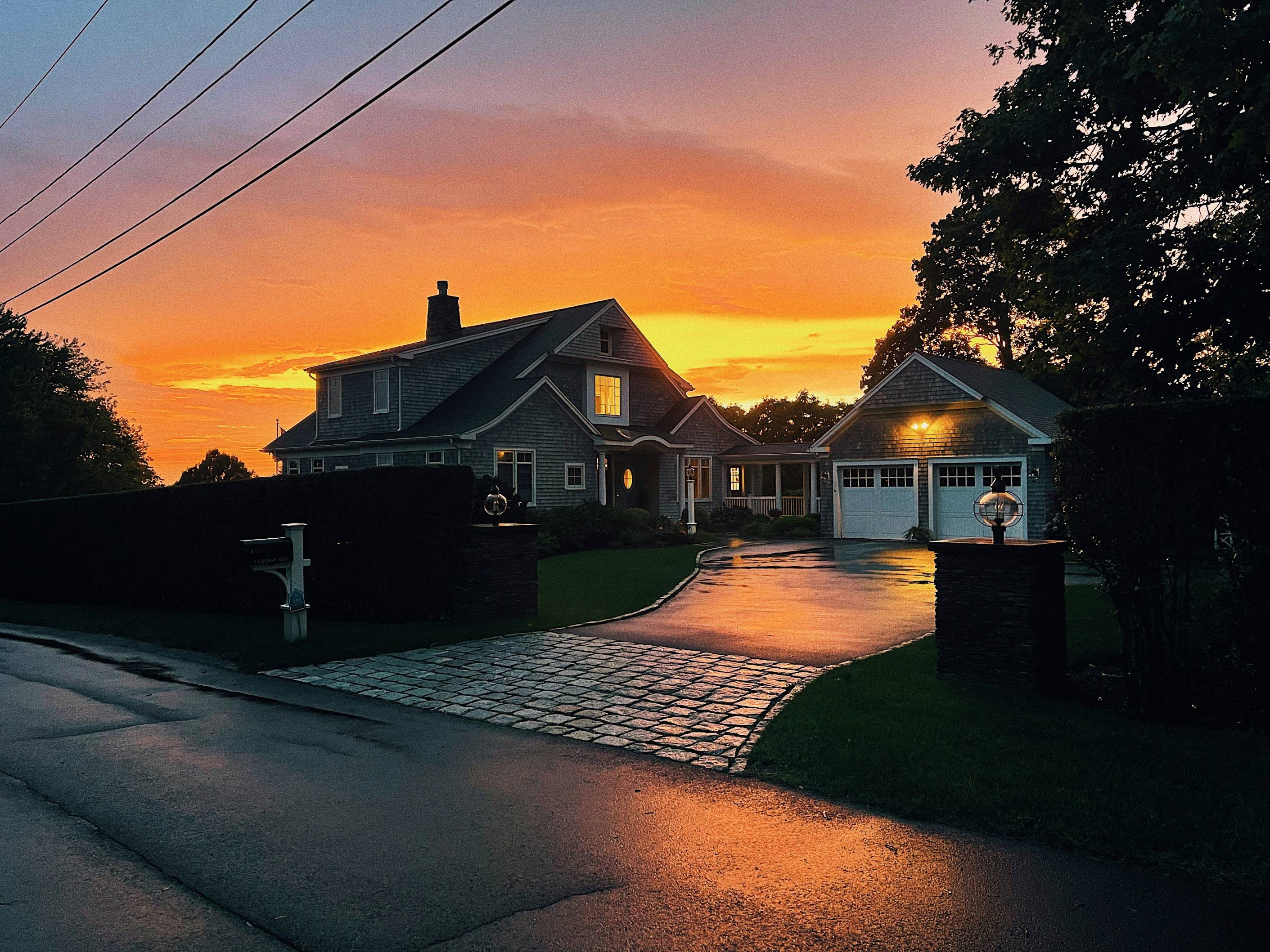 silhouette of houses during sunset