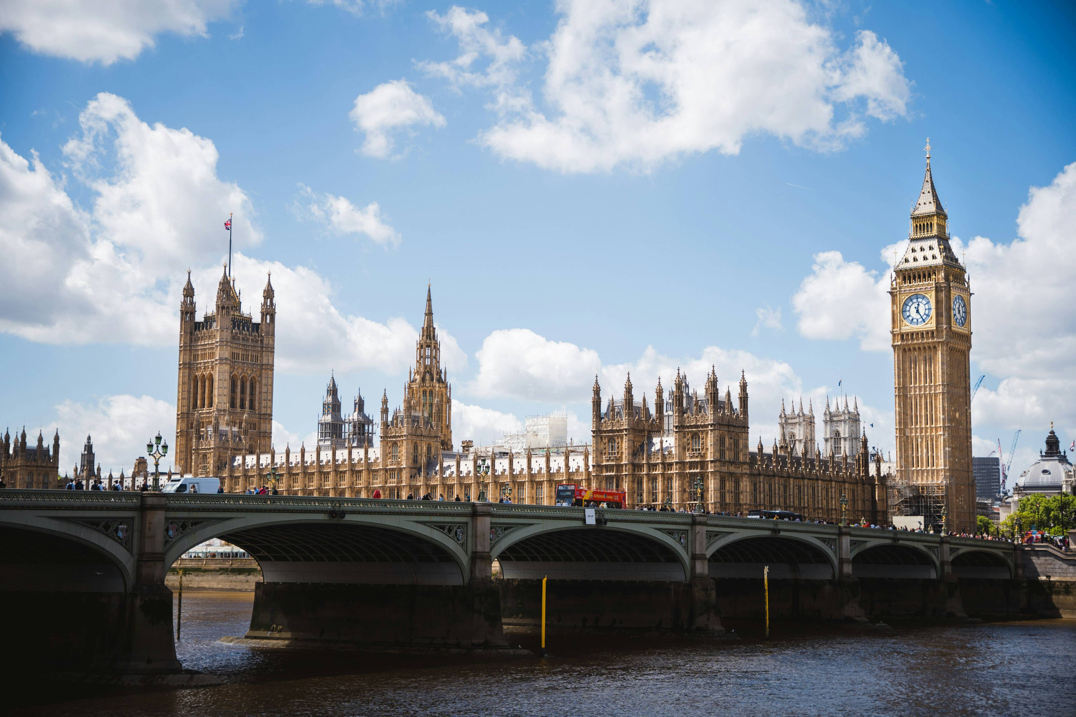 the big ben clock tower towering over the city of london