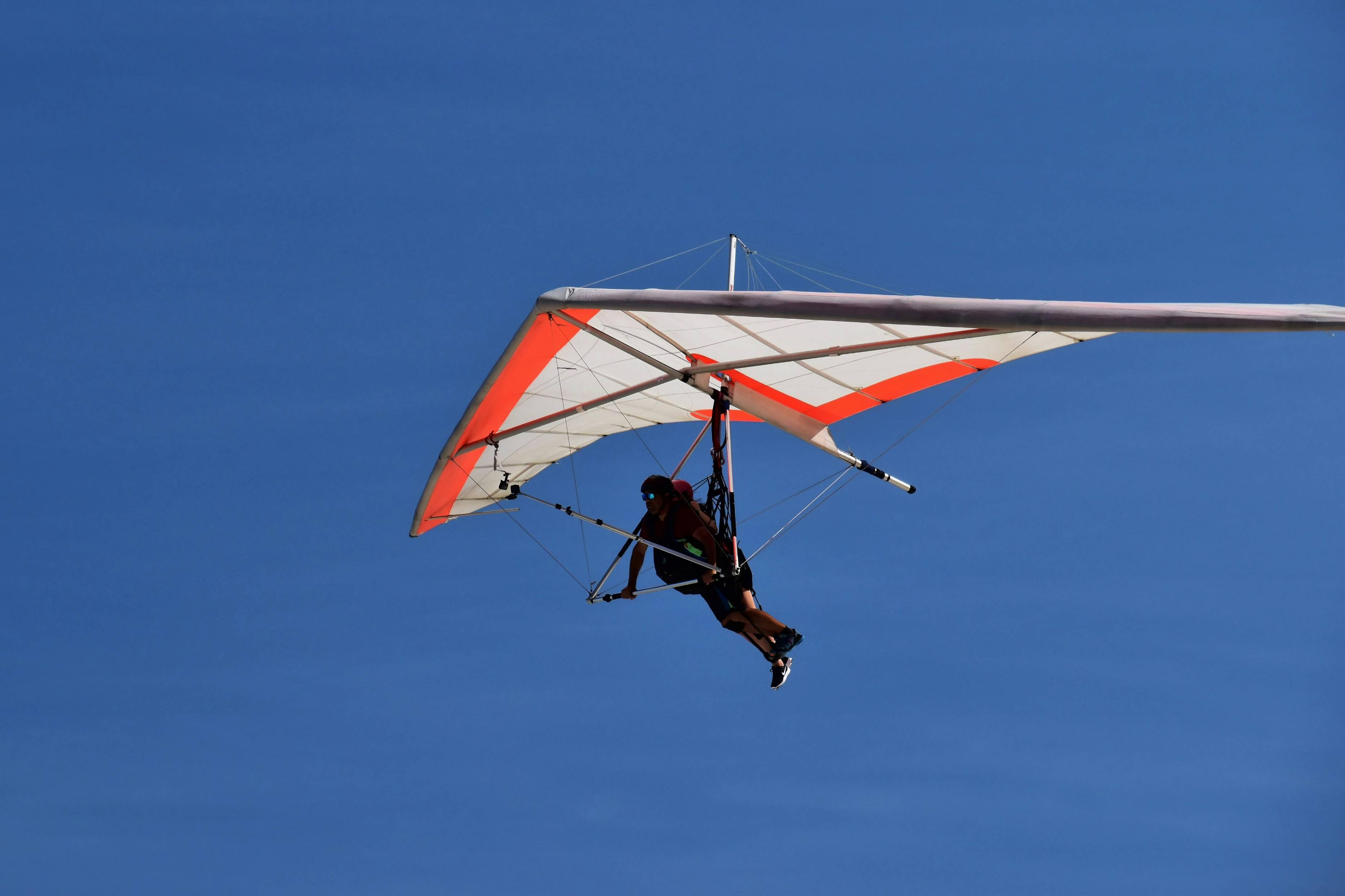 a person on a parachute in the air